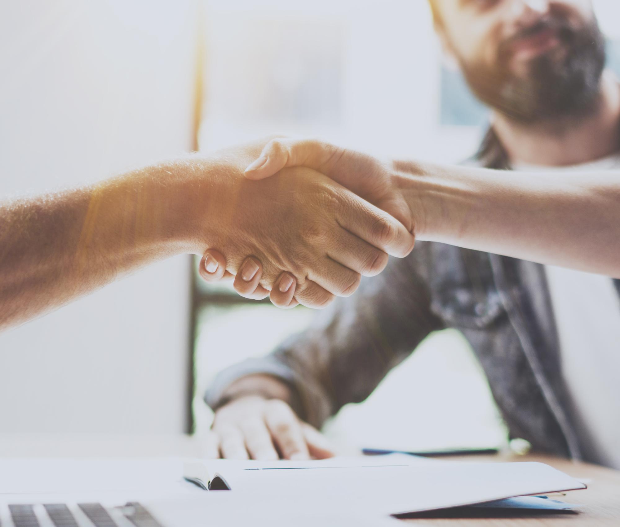 Two people shaking hands