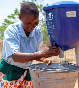 Man using a safe water dispenser