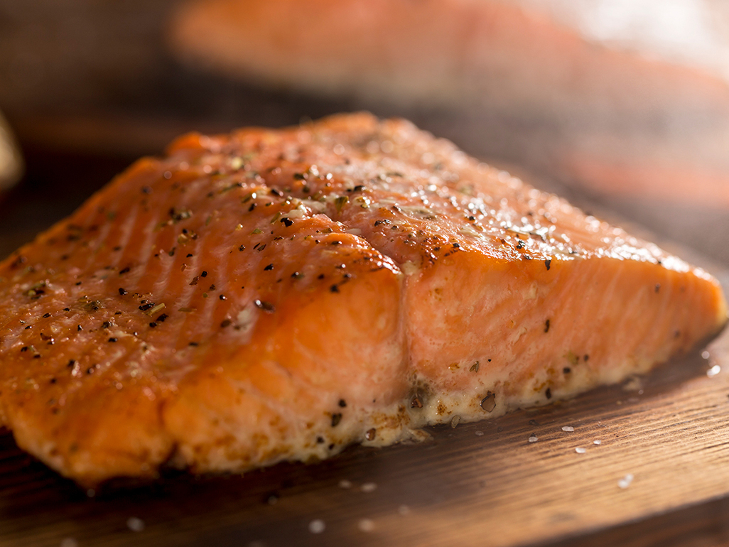 A fillet of grilled or baked salmon 