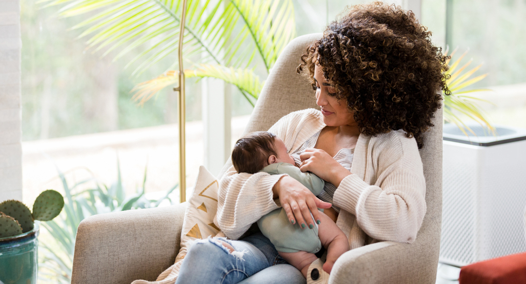 mother breastfeeding her baby