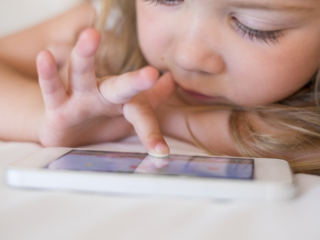 child using a cell phone