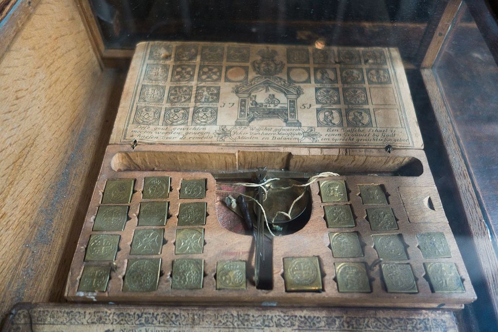 Image of a scale put away in the wooden storage box.