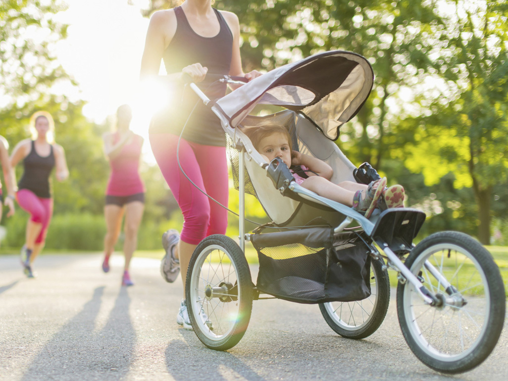 Women running with jogging stroller