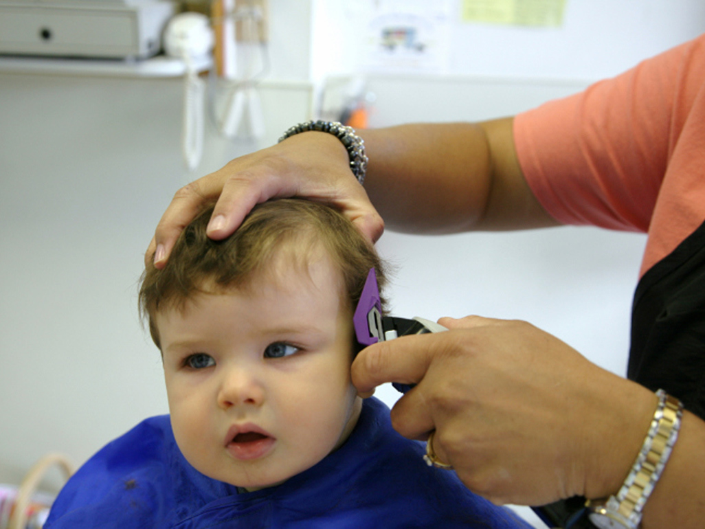 baby getting a haircut