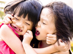 Two pre-schoolers fighting