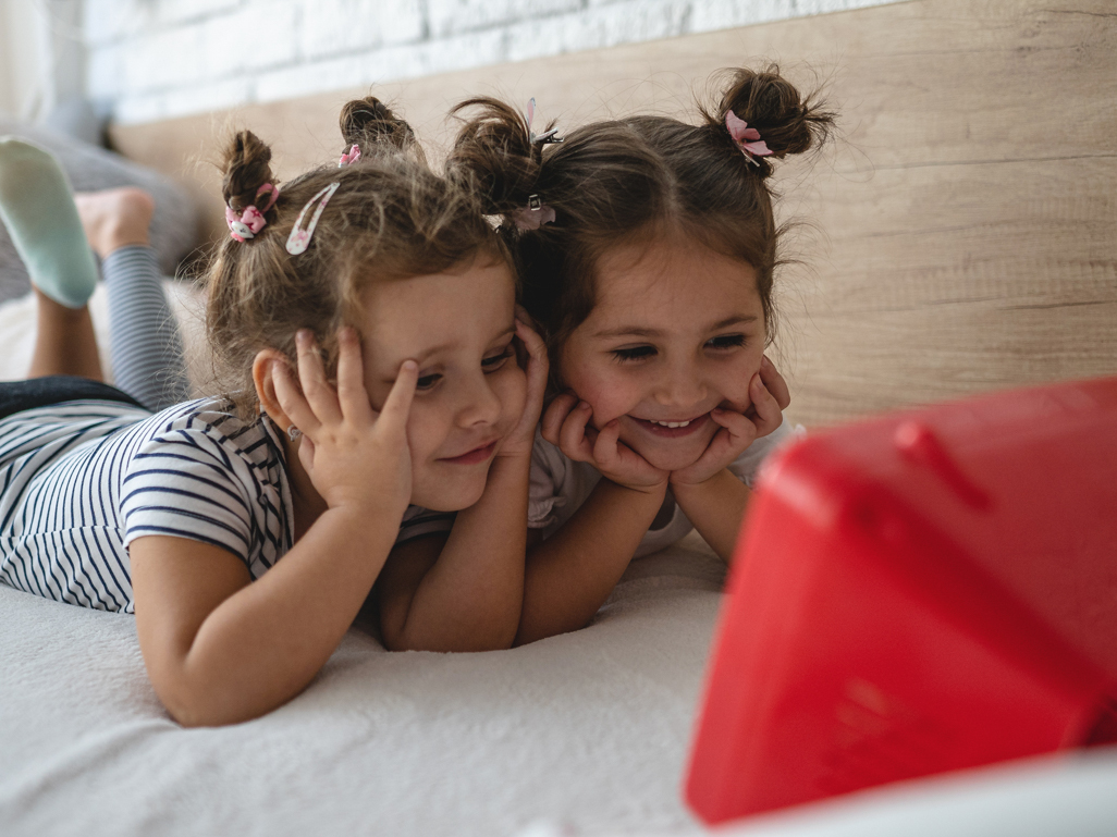 two girl kids smiling