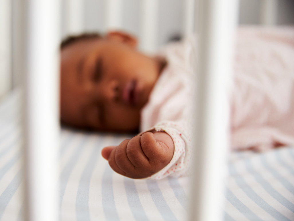 baby sleeping in crib