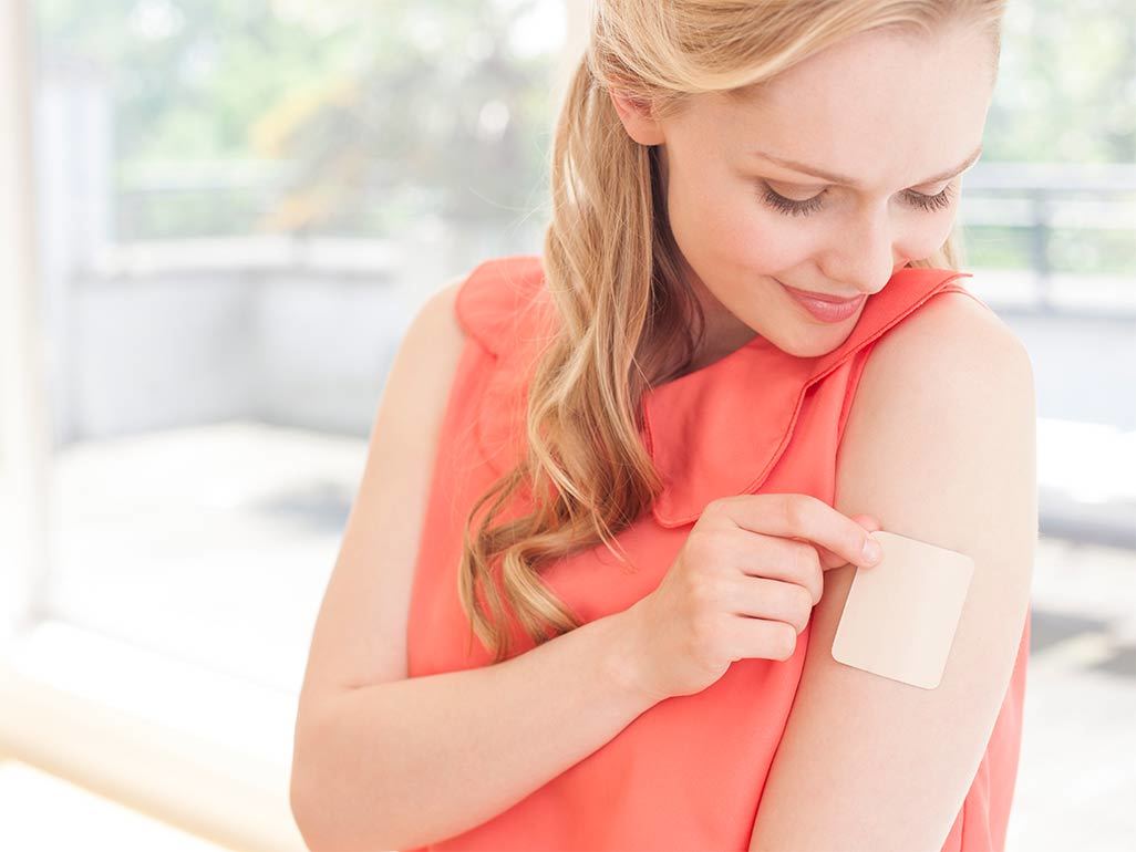 Woman with birth control patch