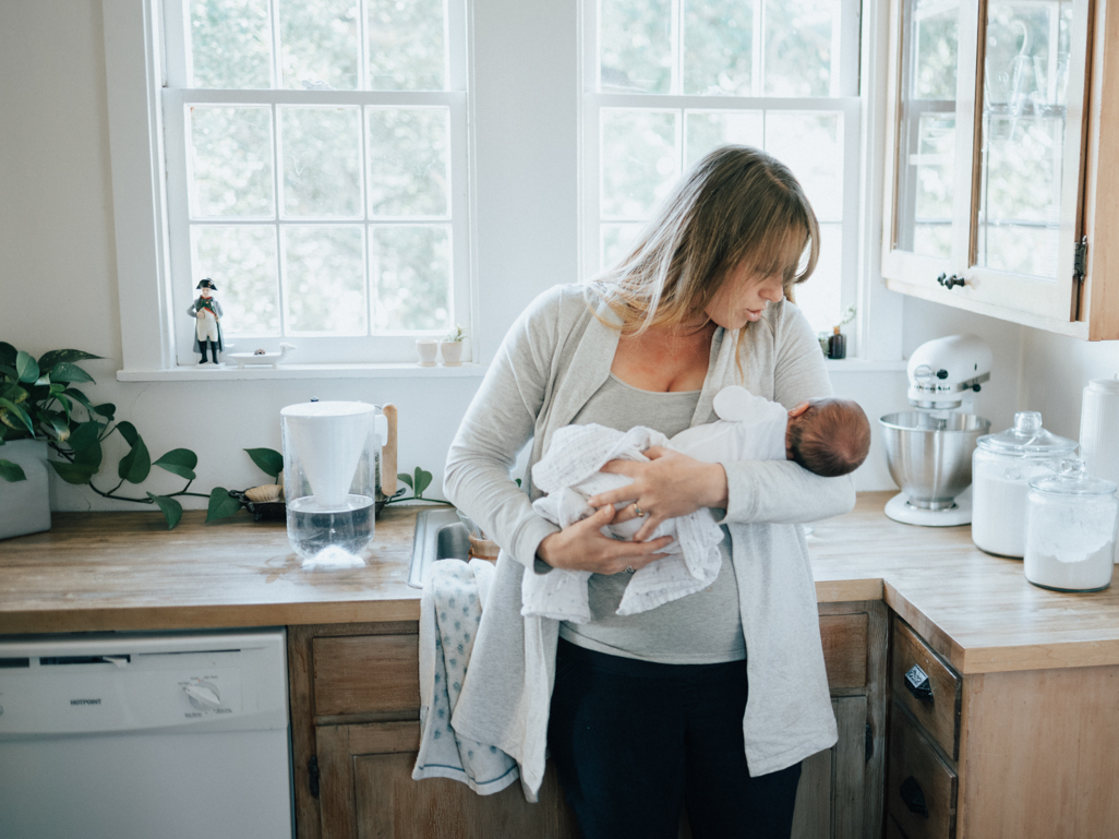 mom holding her sick baby 