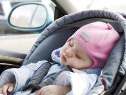 Baby asleep in car seat