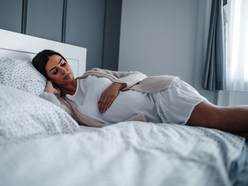 Pregnant woman in bed