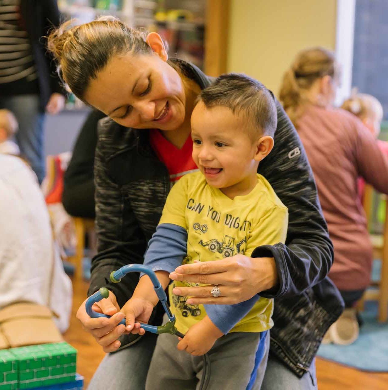 woman and child playing