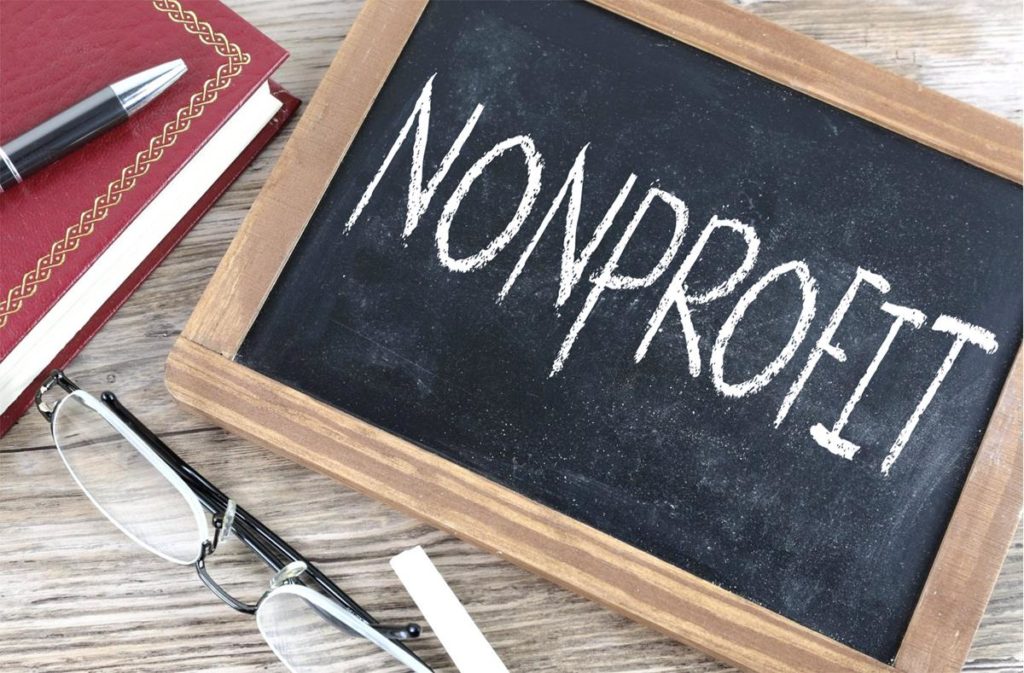 the word "nonprofit" written on black chalkboard