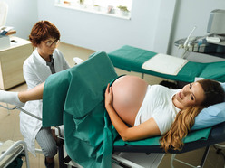 woman having membrane sweep