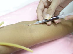 A blood test being carried out.