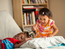 Boy and girl playing together