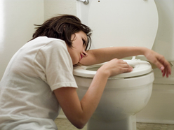 Lady laying on toliet seat