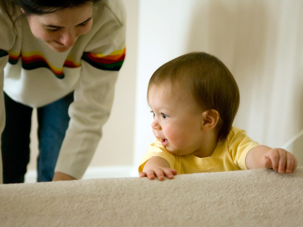 Toddler trying to climb the stairs