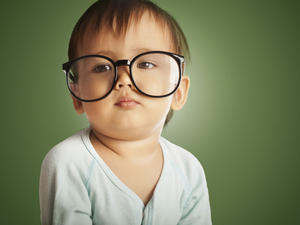 toddler wearing big glasses