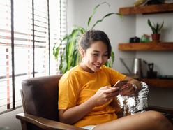 Woman online shopping on her smartphone