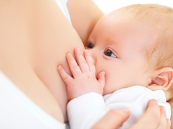 Baby being breastfed