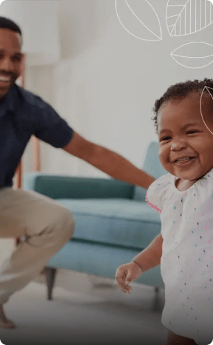 dad playing with little girl