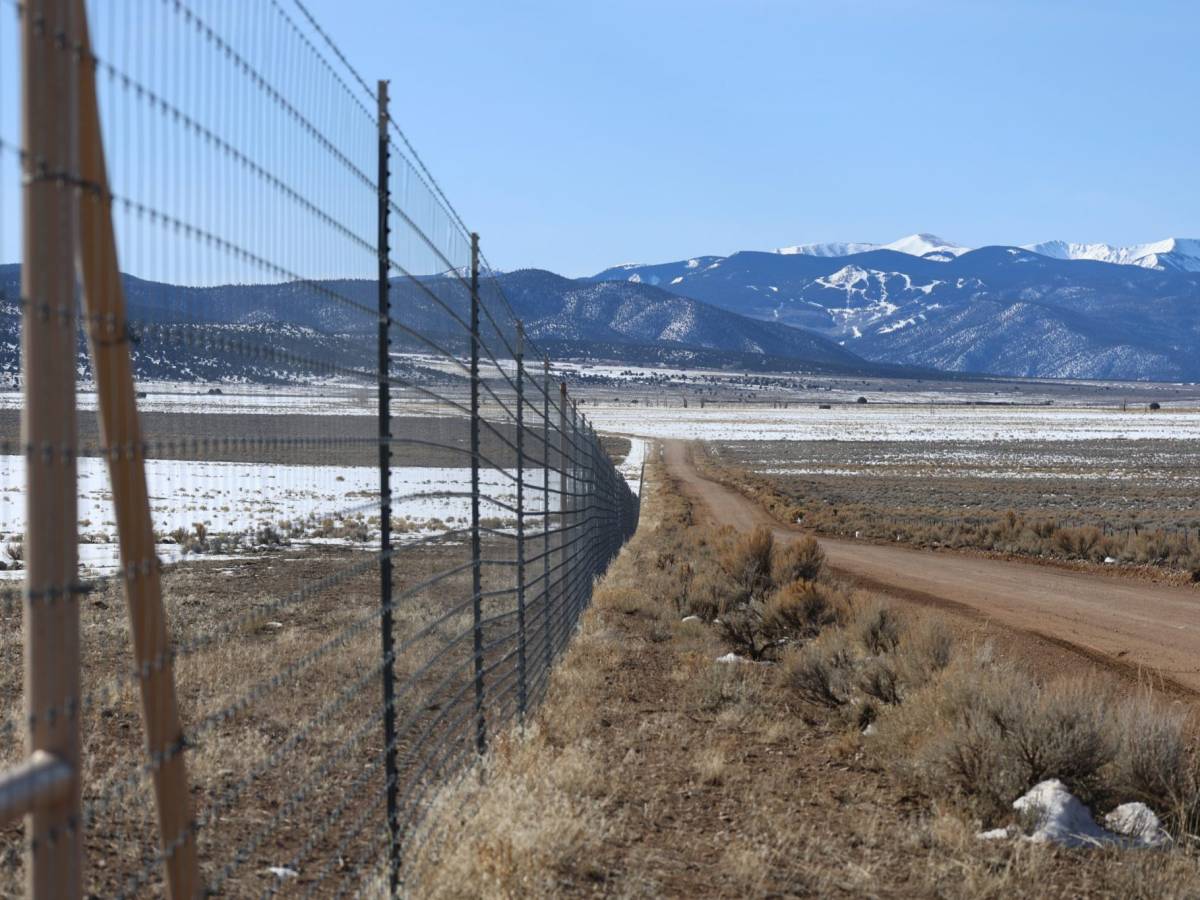 A billionaire’s fence is the latest fault line in a 150-year-old San Luis Valley land war