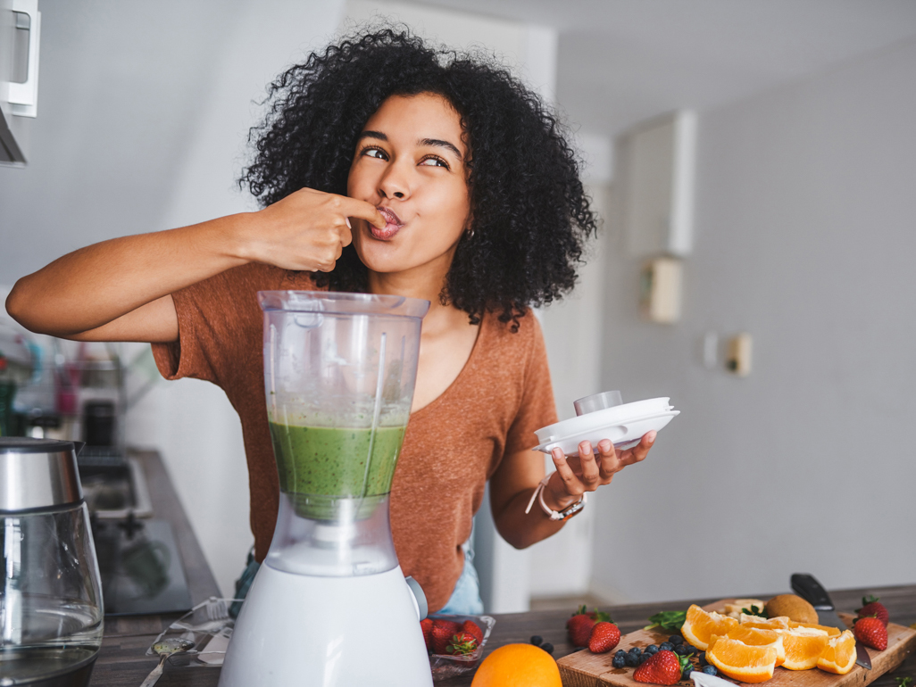 Woman making a smoothie 