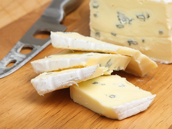 blue cheese on a cutting board