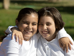 Two girls smiling