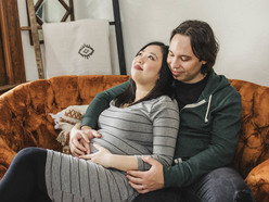 couple cuddling on the couch