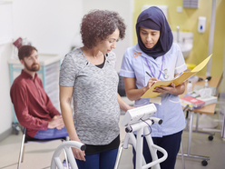 Pregnant lady on scales